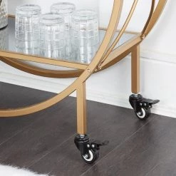 Evelyn Gold Bar Cart with Mirrored Shelves, Wine Glass Rack and Locking Wheel Casters by Decor Therapy -Decor Therapy Sale gold decor therapy bar carts fr11441 1f 1000