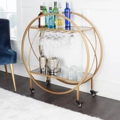 Evelyn Gold Bar Cart with Mirrored Shelves, Wine Glass Rack and Locking Wheel Casters by Decor Therapy -Decor Therapy Sale gold decor therapy bar carts fr11441 31 1000
